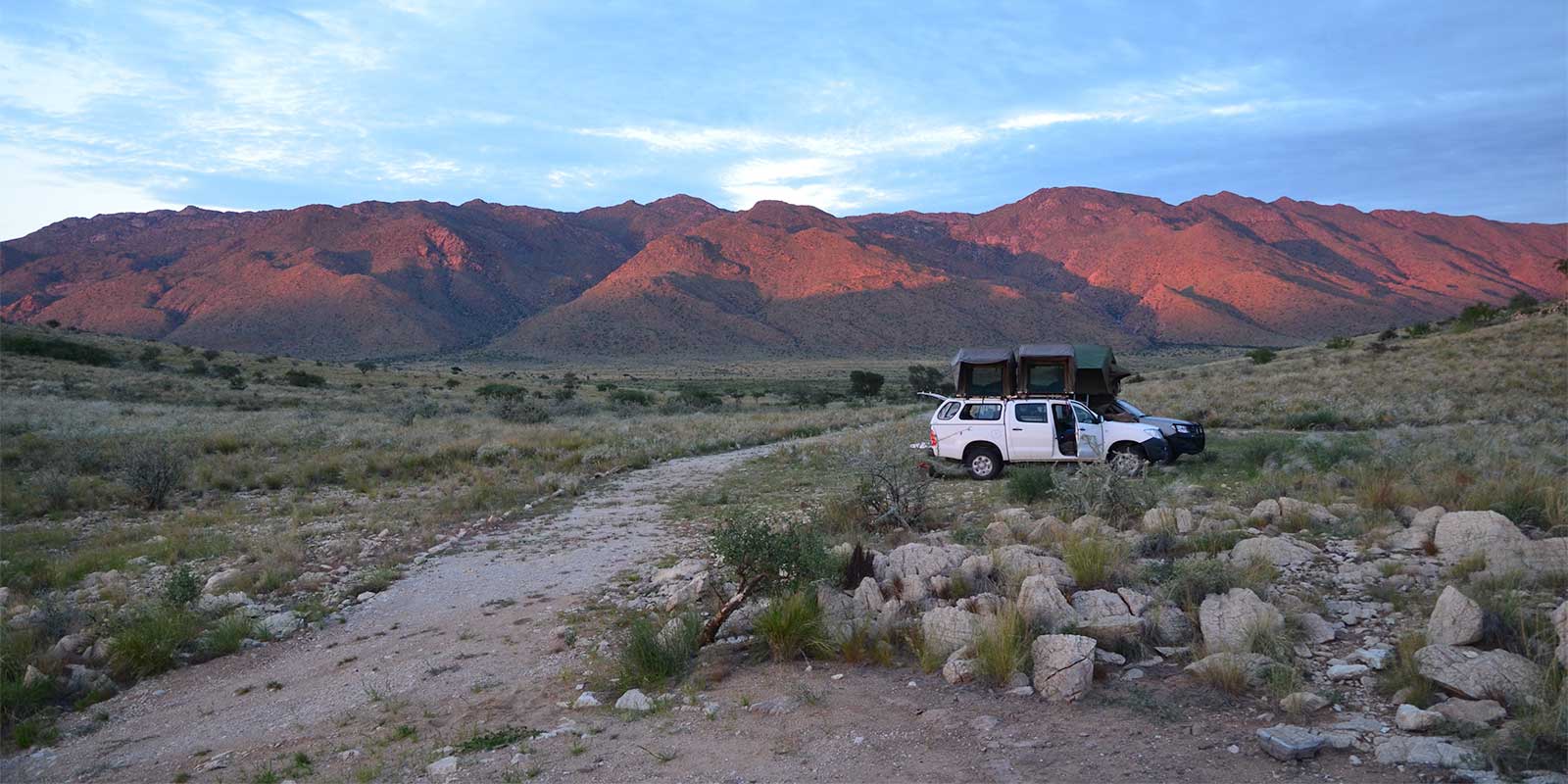 Rooftop tent vehicle in the desert in Namibia