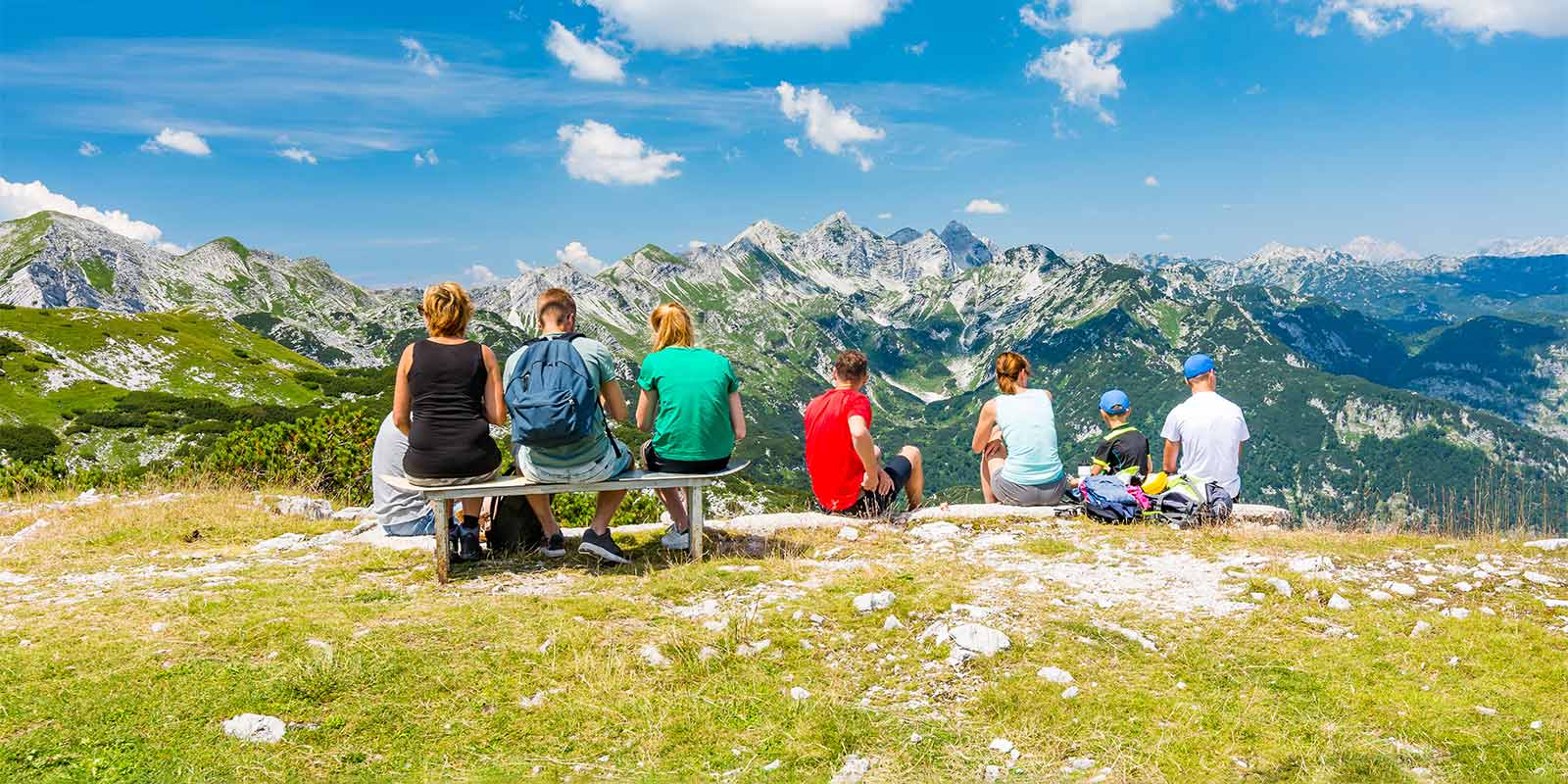 Family group looking out to Triglav National Park in Slovenia