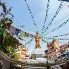Tahiti Tole Stupa with prayer flag, Nepal.