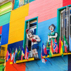 Colourful puppets on side of building in La Boca area of Buenos Aries, Argentina