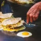 Making okonomiyaki in Japan.