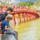 Father & son at Hoan Kiem Lake, Hanoi, Vietnam