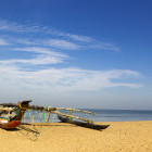 Traditional fishing boat on the beach in Negombo, Sri Lanka