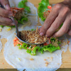 Making spring rolls in Vietnam