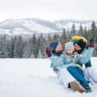 Family having fun in the snow in the High Tatras, Slovakia