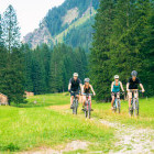 Family of four cycling in Austria