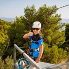 Boy ziplining in Croatia