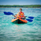 Father and son kayaking in Croatia