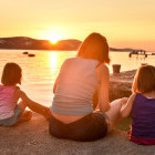 Family watching the sunset in Hvar, Croatia