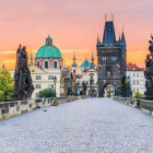 Charles Bridge over the Vltava River and Old Town Tower in Prague, Czech Republic