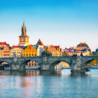 Charles Bridge over the Vltava River and Old Town Tower in Prague, Czech Republic