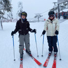 Siblings skiing in Finland