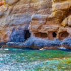 Caves within cliffs in Matala, Crete in Greece