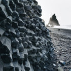 Basalt columns on a black sand beach in Vik, Iceland
