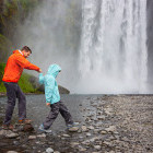 Father and child at Skogafoss, Iceland