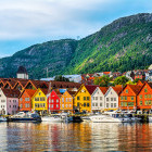 Colourful houses and yachts lining the harbour in Bergen, Norway