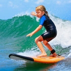 Young girl surfing