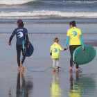 Heading out to surf in Portugal