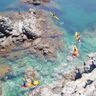 Aerial shot of group kayaking in Spain