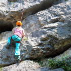 Girl rock climbing in the Pyrenees
