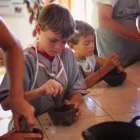 Children enjoying chocolate making in Peru