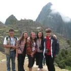 A family in front of Machu Picchu in Peru