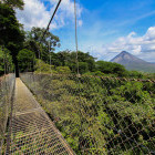Hanging bridge and view of Arenal Volcano in Costa Rica