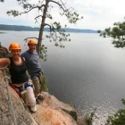 Guests participating in via ferrata at Parc Aventures du Cap Jaseux, Canada.