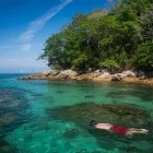 Snorkelling in the blue and green lagoons in the bay of Ilha Grande, Brazil