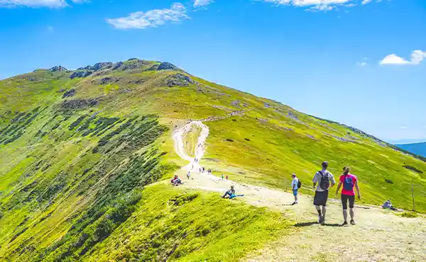 Couple walking in the High Tatras, Slovakia