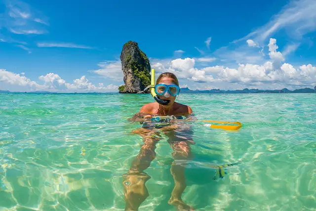 Woman snorkelling in Thailand