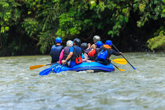 Group white-water rafting in Borneo