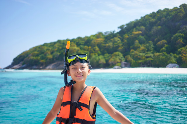 Boy snorkelling in Thailand