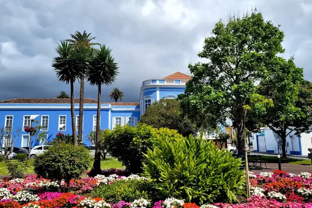Blue building and city garden in Sao Miguel's capital, Ponta Delgada, the Azores.