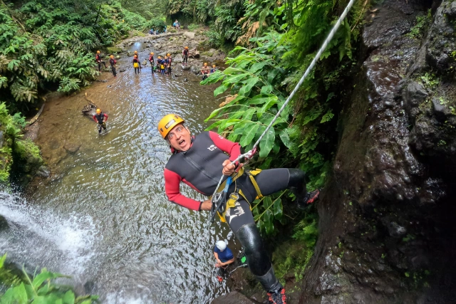 Ravi Tekchandani abseiling in the Azores.