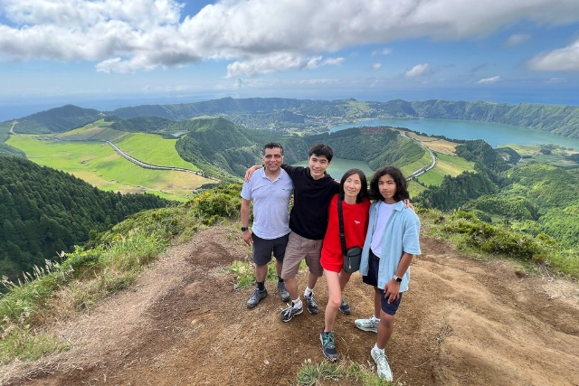 The Tekchandani family overlooking a volanic lake in the Azores.