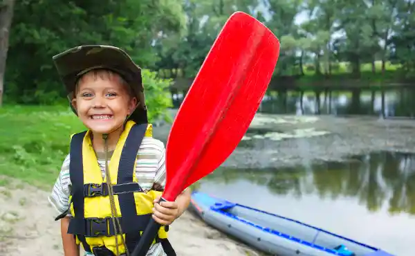 Boy kayaking in Central Europe