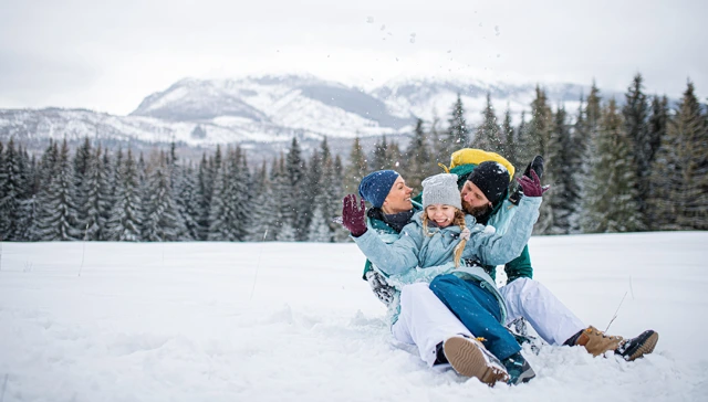 Family having fun in the Tatras Mountains, Slovakia