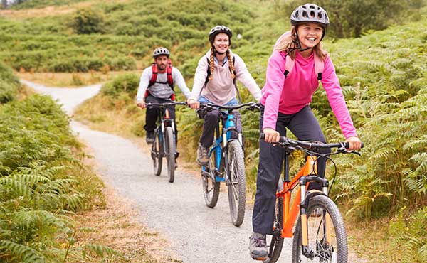 Family on a bike ride on holiday
