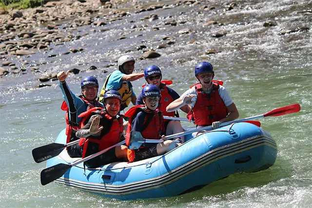 Family white-water rafting in Borneo.