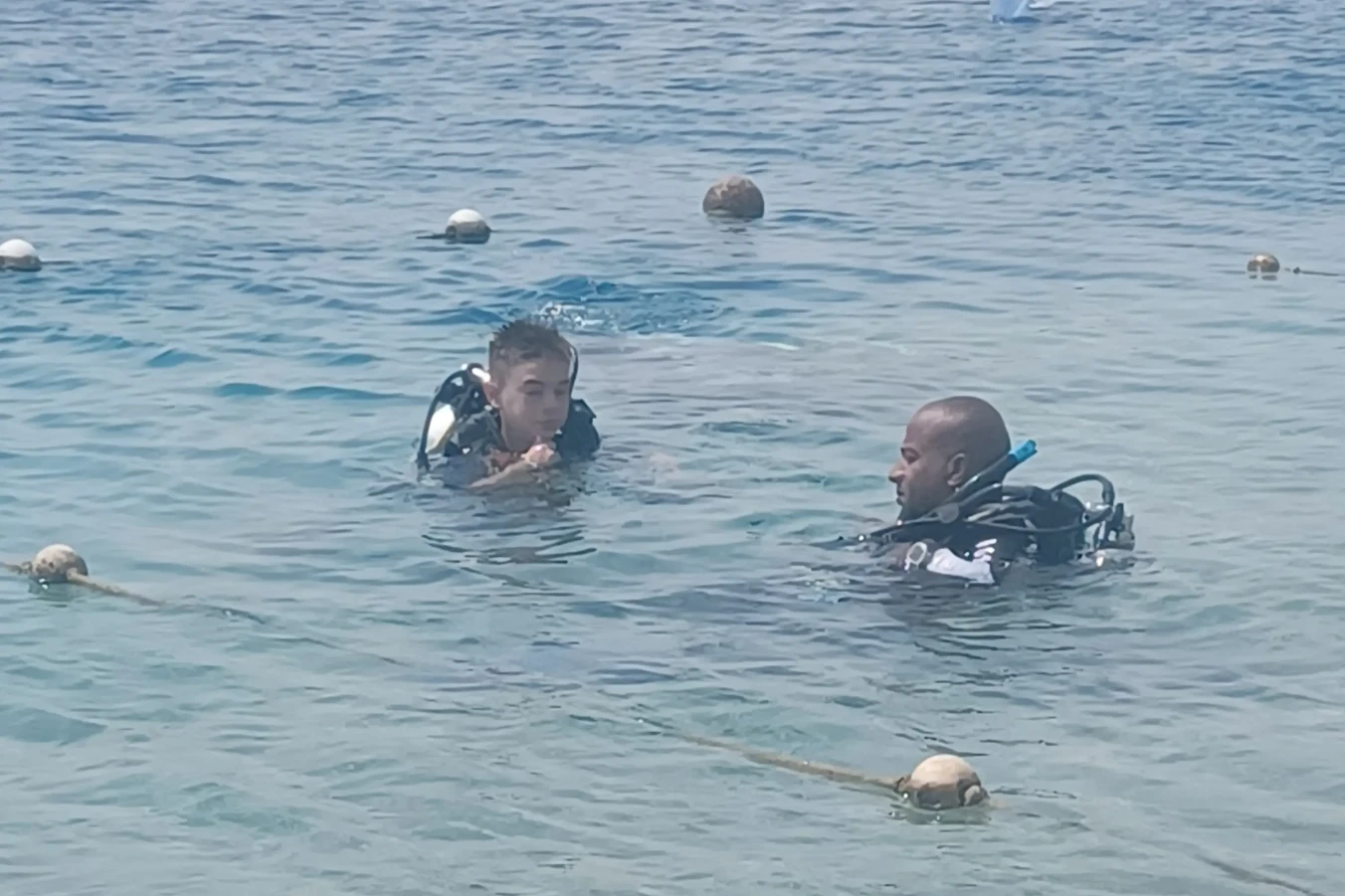 Boy learning to dive in Egypt