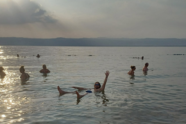 Sam floating in the Dead Sea in Jordan.