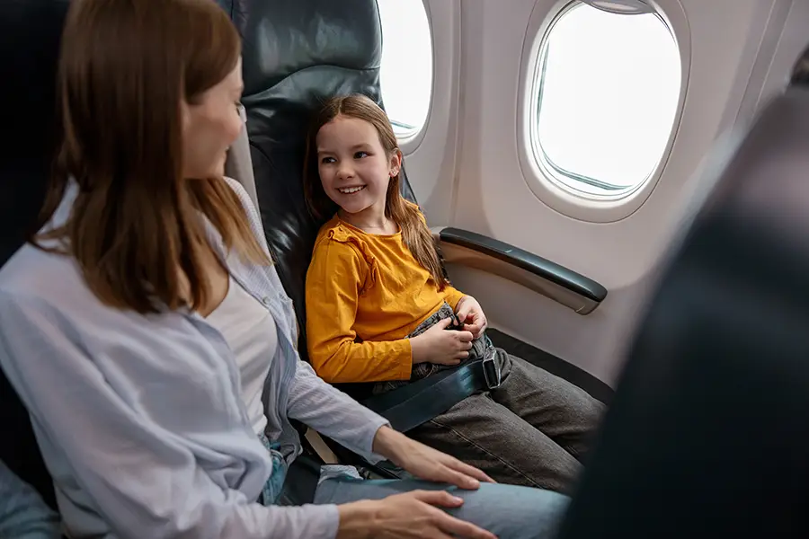 Mother & daughter on plane