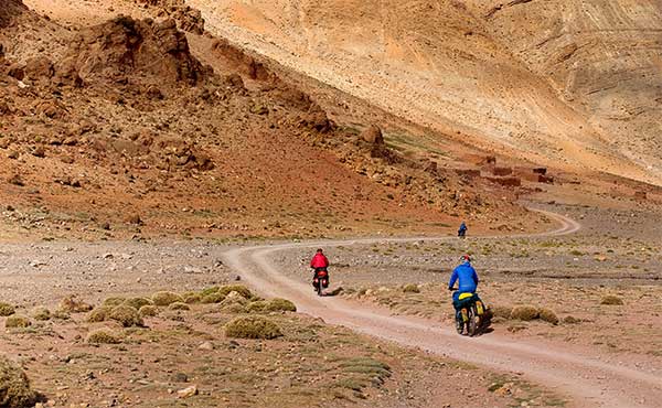 Cyclists in the Atlas Mountains, Morocco