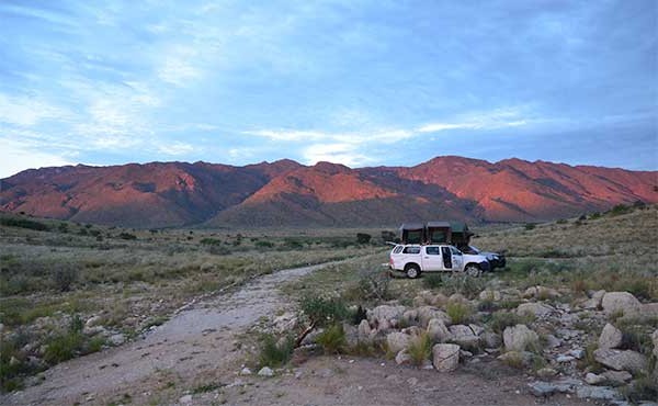Rooftop tent vehicle in the desert in Namibia