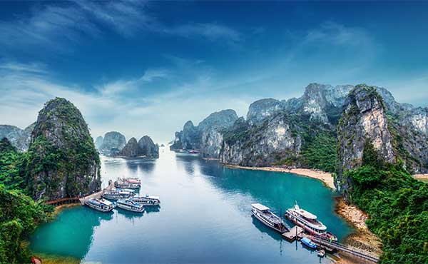 Aerial shot looking down to the boats docked at Ha Long Bay in Vietnam
